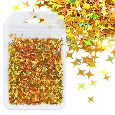 Colorful star-shaped confetti for celebration and decoration, perfect for events, parties, and arts & crafts. Gold, green, pink, and multicolor accents enhance any festive occasion.