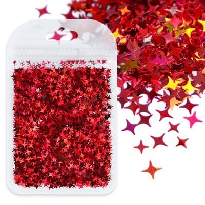 Sparkly red star-shaped confetti for festive decorations and celebrations.