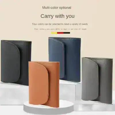 Elegant multi-color leather wallets displayed on a white platform, perfect for stylish and functional everyday use. Available in black, blue, gray, and tan, these wallets offer a chic carry-all solution.