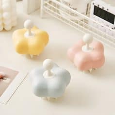 Colorful cloud-shaped storage containers with rounded white knobs, stylishly arranged on a white desk, ideal for organizing accessories or cosmetics in a modern Monalisa Store setting.