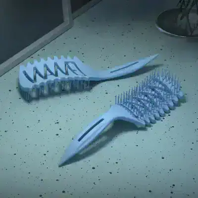 Light blue hairbrushes with wide teeth, ideal for gentle hair detangling and styling. Perfect for professional salons or home use to maintain healthy hair and scalp.