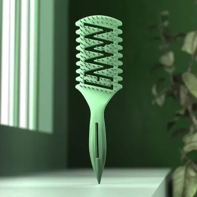 Colorful hairbrush with zigzag pattern for hair styling, eco-friendly design, suitable for salon and personal use, part of Monalisa Medical's beauty product collection.