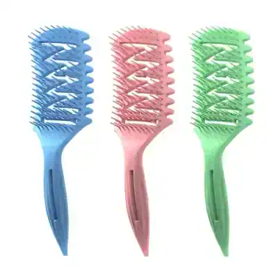 Colorful hair detangling combs in blue, pink, and green, perfect for salon and personal hair care routines. Durable plastic design with wide teeth for gentle hair detangling.