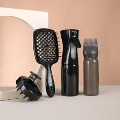 Electric hair styling tools including a hairbrush, spray bottle, and scalp massager, showcasing professional hair care and styling equipment at Monalisa Store.