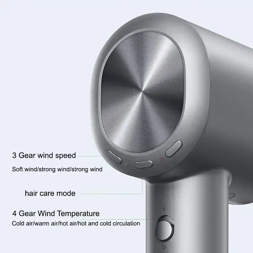 High-quality silver hair dryer with multiple heat and wind speed settings, including cold air circulation for professional hair care and styling. Perfect for salons and home use.