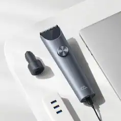 Electric hair trimmer with adjustable settings, USB charging port, and sleek design perfect for grooming routines. Compatible with USB power sources for convenient use.