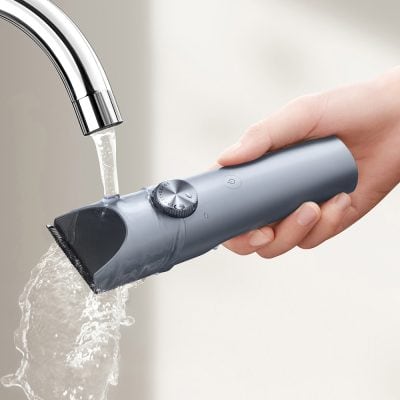 Compact cordless electric shaver with waterproof design, ideal for precise facial hair grooming and trimming. Suitable for men seeking efficient shave solutions.