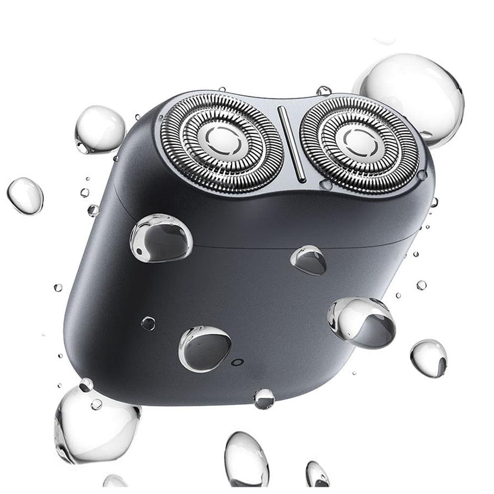 Shaver with waterproof design and dual rotating blades, ideal for men’s grooming, wet and dry use, featuring modern black finish for a smooth shave.