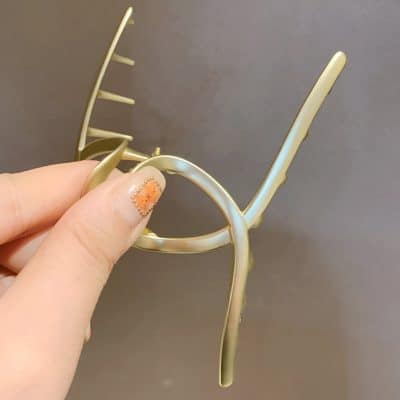 Elegant gold eyeglasses with a modern design, perfect for stylish vision correction or fashion accessories. Suitable for women seeking trendy and high-quality optical frames.