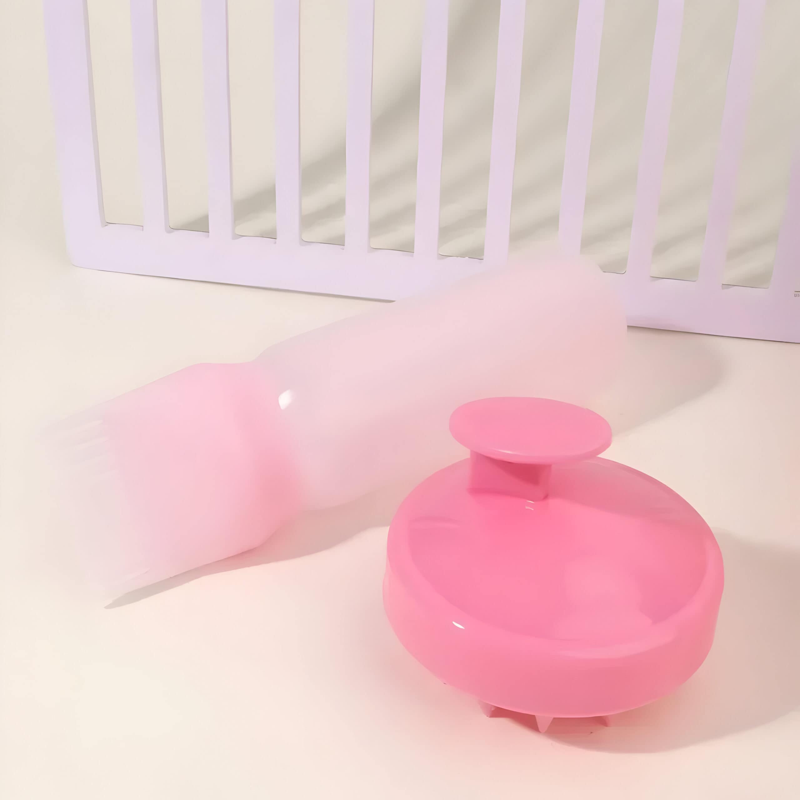 Pink contact lens case with a clear plastic protective cover on a white background at Monalisa Medical Store.