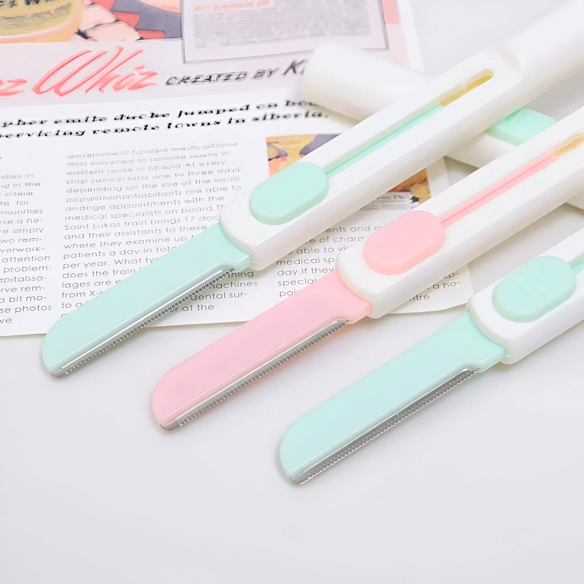 Disposable eyelash extension tweezers with pastel pink, mint green, and baby blue handles, ideal for professional lash extension application.