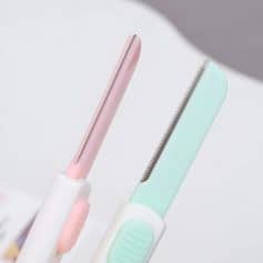 Pink and green hair straighteners with ceramic plates, modern styling tools for hair care and beauty at Monalisa Medical Store.