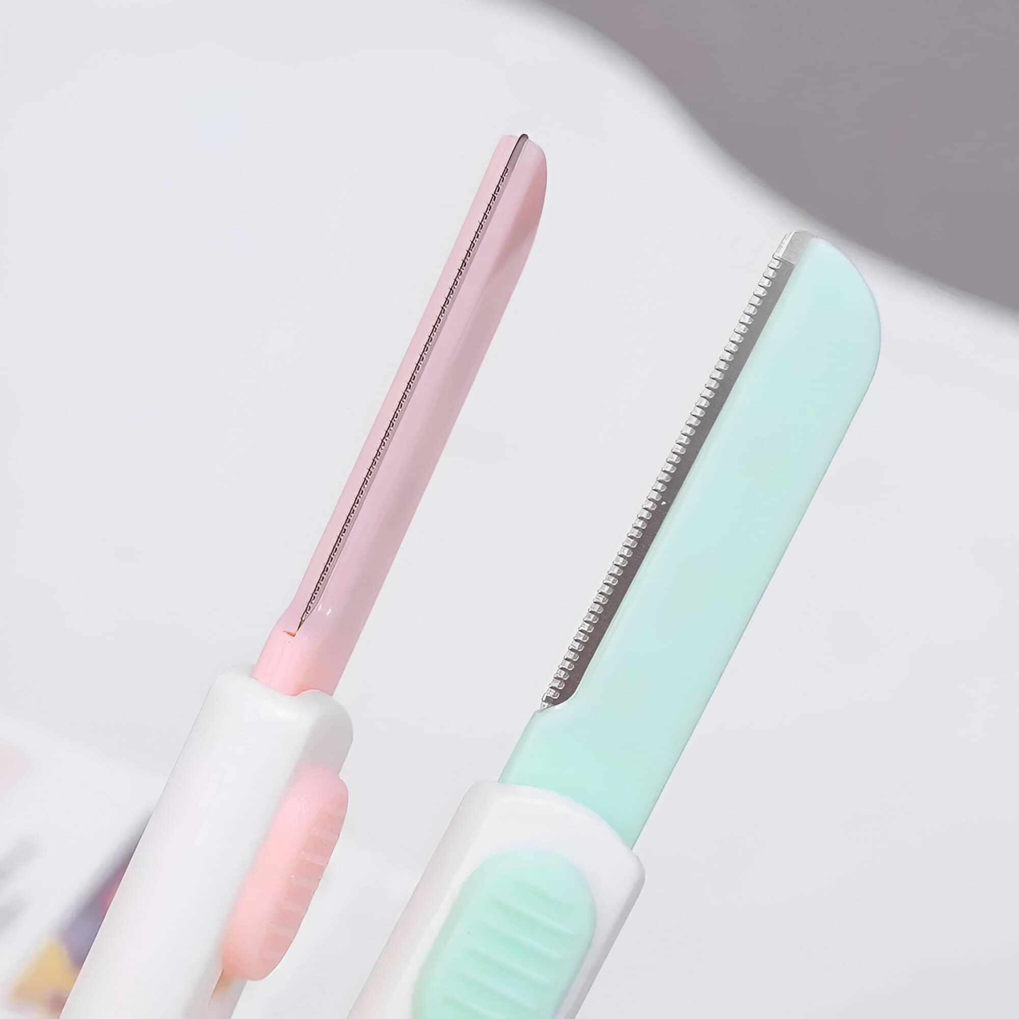 Pink and green hair straighteners with ceramic plates, modern styling tools for hair care and beauty at Monalisa Medical Store.