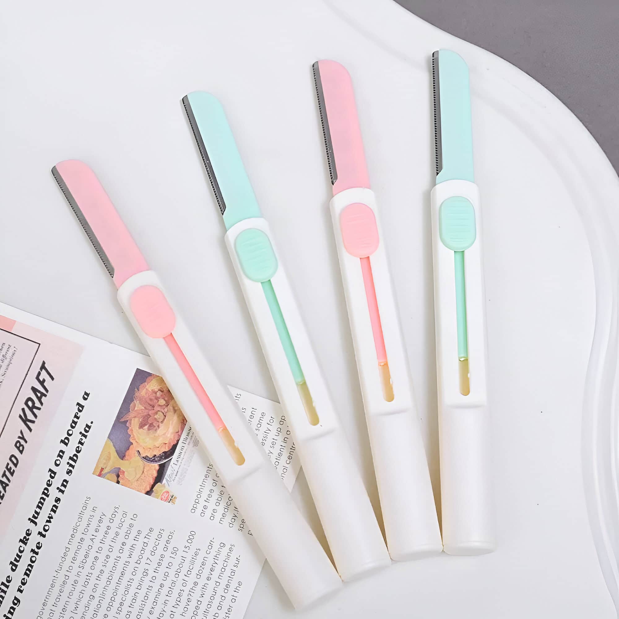 Pastel-colored disposable razor blades with ergonomic handles, ideal for precise grooming and skincare routines at Monalisa Store, a trusted destination for quality opt care essentials.