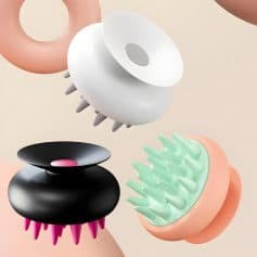 White and black massage and facial cleansing brushes with silicone bristles, designed for skincare at Monalisa Store, perfect for gentle cleansing and improving skin health.