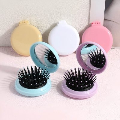 Pink, white, and yellow eyelash storage cases with mirrors, containing false eyelashes, displayed on a pink surface. Perfect for organizing and enhancing eyelash application routines.
