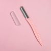 Cosmetic razors for gentle facial hair removal with protective cover on pink background, suitable for at-home skincare.