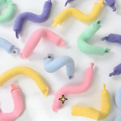 Colorful baby nursing pillows in pastel shades, perfect for infant comfort and support, displayed on a white background at Monalisa Store. Ideal for breastfeeding, tummy time, and gentle cuddles.