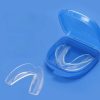 Clear dental night guard in a blue case, suitable for teeth grinding and clenching prevention, offering comfortable fit and protection, designed for optimal oral health.