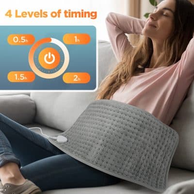 Relaxing woman with heating pad on her lap for pain relief, digital timer showing 4 levels of heating duration, cozy home setting, soft light, wellness and comfort concept, Monalisa Store, opt healing therapy, hot therapy device, pain management product, therapeutic heat pad, ergonomic design, health and wellness equipment.