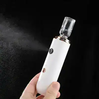 Fine mist spray facial mister, portable skincare atomizer, travel-size facial spray for hydration, beauty, and skincare routines. Perfect for moisturizing skin anytime on the go.
