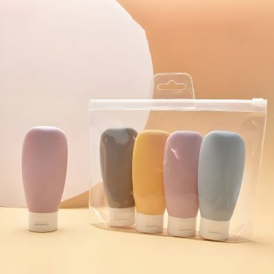 Colorful silicone facial cleansing brushes in pastel shades, packaged in a clear travel pouch, ideal for skincare routines and gentle facial cleansing. Perfect for skincare enthusiasts seeking quality tools.