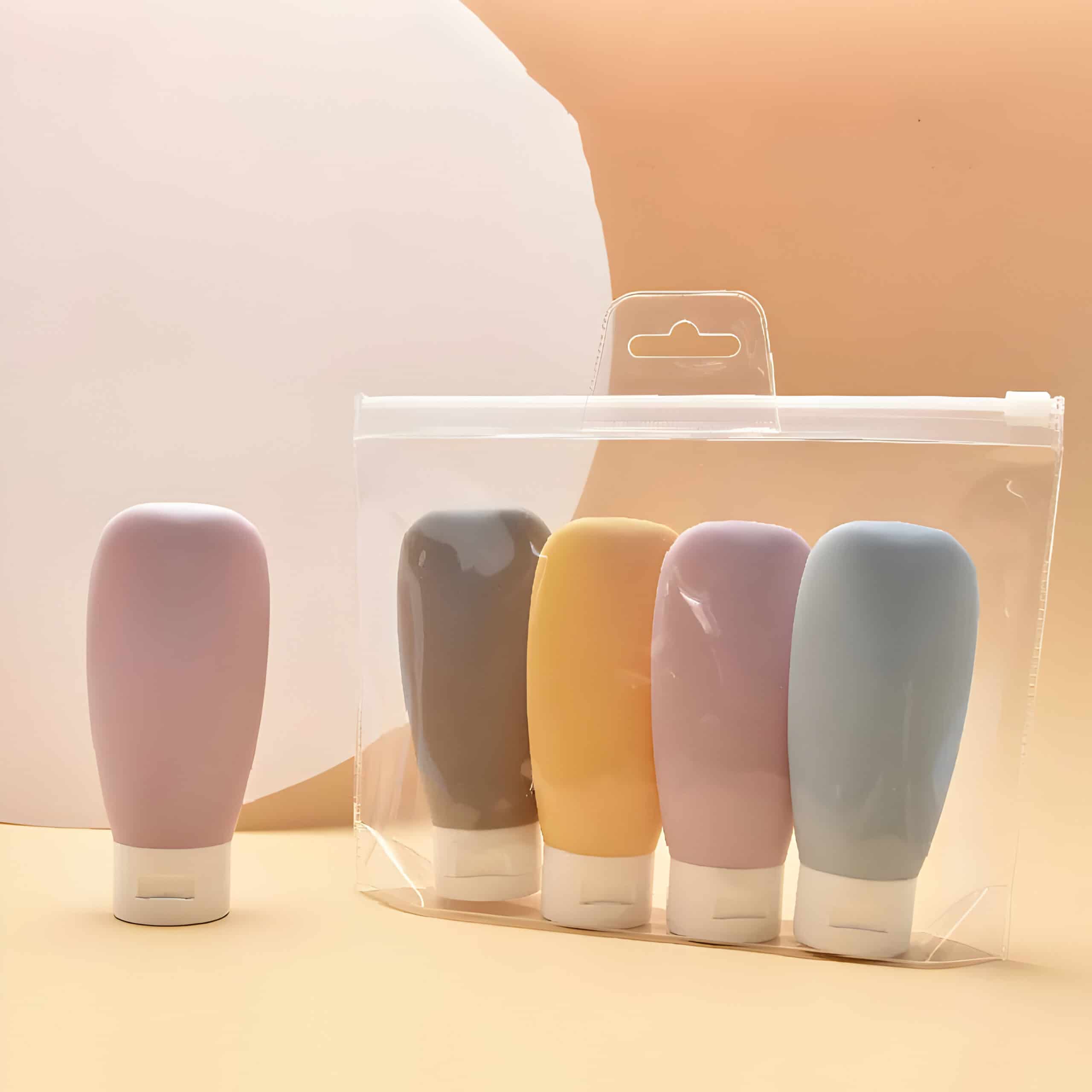 Colorful silicone facial cleansing brushes in pastel shades, packaged in a clear travel pouch, ideal for skincare routines and gentle facial cleansing. Perfect for skincare enthusiasts seeking quality tools.