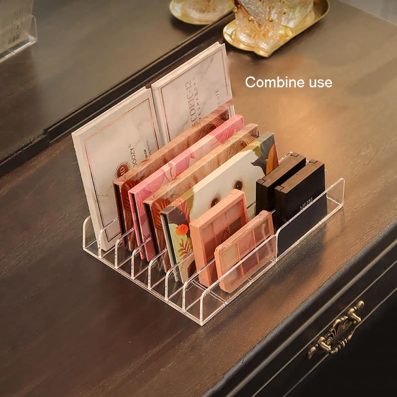 Stacks of optometry glasses cases organized in a clear acrylic holder for display or storage at Monalisa Store, ideal for eye care and eyewear accessories.