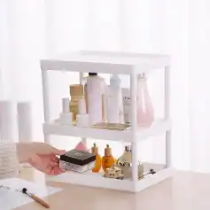 Luxurious skincare products displayed on a modern white tiered stand, perfect for organizing beauty and skincare essentials at Monalisa Store, a premier destination for cosmetic and skincare needs.