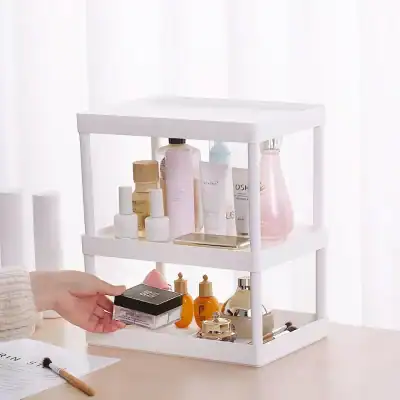 Luxurious skincare products displayed on a modern white tiered stand, perfect for organizing beauty and skincare essentials at Monalisa Store, a premier destination for cosmetic and skincare needs.
