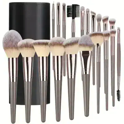 Brush set with makeup brushes and tools in silver handles, ideal for professional cosmetic applications. High-quality bristles designed for flawless makeup application. Perfect for beauty enthusiasts and makeup artists.
