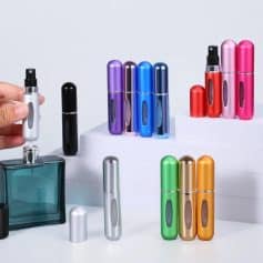 Colorful cosmetic spray bottles and containers displayed at Monalisa Store, ideal for beauty and skincare products. Perfect for personalized packaging, travel-sized containers, and beauty product presentation.