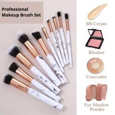 Brush set with marble handles for professional makeup application, including blush, concealer, and eye shadow brushes. Perfect for achieving flawless makeup looks with high-quality tools.