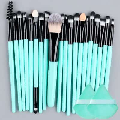Brush set with UV-reactive handles for makeup artistry and professional beauty tools.