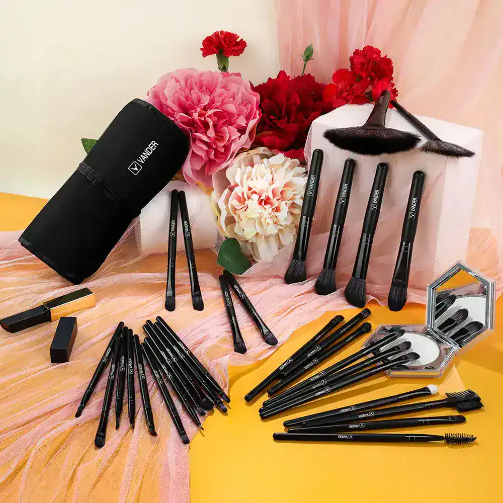 VANDER makeup brush set with pink and red flowers, included in Monalisa Medical Store, designed for professional beauty and cosmetic application, featuring various brushes and tools for face and eye makeup.