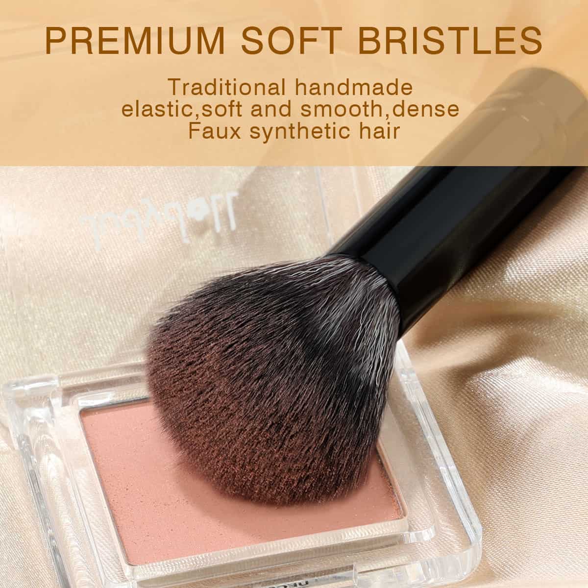Soft makeup brush with dense, handcrafted bristles and a blush on a satin surface, ideal for flawless blending and application in professional beauty routines.