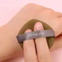 Eggshell-shaped cosmetic product with