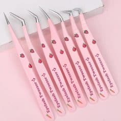 Pink eyelash tweezers with strawberry and carrot designs, perfect for precise eyelash extension application. Stylish and functional tools from Monalisa Store for beauty professionals.
