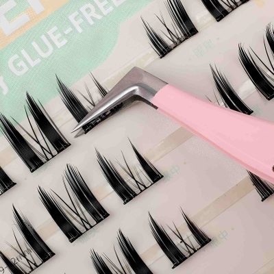 Silicone eyelash extensions with eyelash applicator tool and adhesive tape on a white background, professional eyelash extension materials, Monalisa Store.