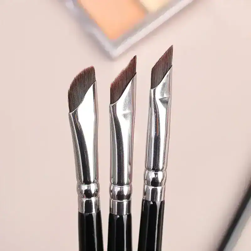 Brush set for eyebrow and eyelash styling, professional precision makeup tools, curved design for detailed application, high-quality stainless steel brushes for beauty salons, Monalisa Store opt options for makeup artists.