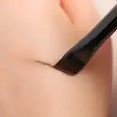 Suction device removing blackheads from skin for facial care at Monalisa Store.