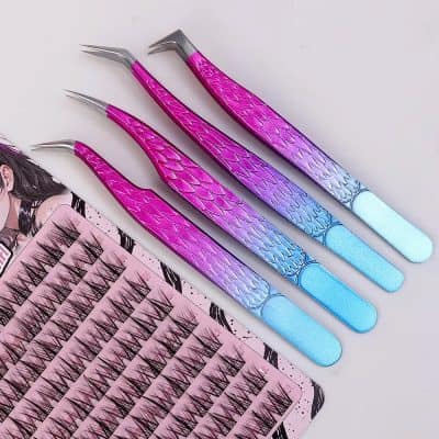 Pink and purple eyelash extension tweezers with a mermaid scale pattern, designed for precise eyelash application at Monalisa Store.