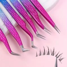 Colorful eyelash extension tweezers with pink scales design for precise eyelash application and beauty salon professional use.