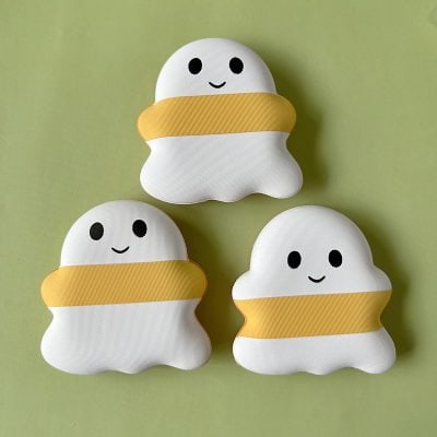 Cute cloud-shaped storage containers with smiling faces and yellow bands, ideal for organizing eyewear, accessories, or small items at Monalisa Store. Perfect for adding a playful touch to optical or eyewear displays.