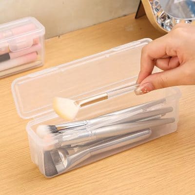 High-quality makeup brushes stored in a clear plastic organizer, ideal for professional and personal cosmetics application at Monalisa Store.