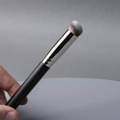 Silicone face brush for skincare routines, close-up of cleaning tool.
