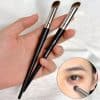 Precision eyeshadow brushes for makeup application and blending, ideal for professional and at-home beauty routines. Stylish black handles with silver ferrules enhance your cosmetic tools collection.