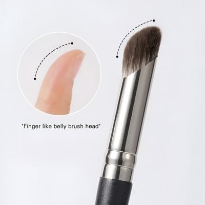 Soft-bristle makeup brush with a sleek handle, designed for precise application, featuring a finger-like belly brush head for easy control and definition.