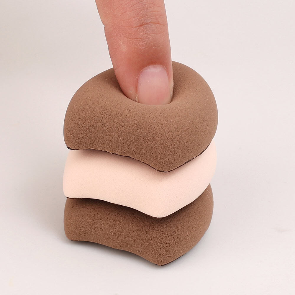 Soft, multi-color beauty blender sponges stacked for makeup application, available at Monalisa Store for professional and everyday cosmetics needs.