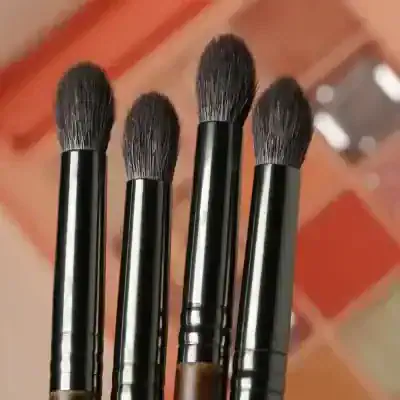 Soft makeup brushes with black handles, ideal for blending eyeshadow and contouring, displayed at Monalisa Store for professional and beauty use.